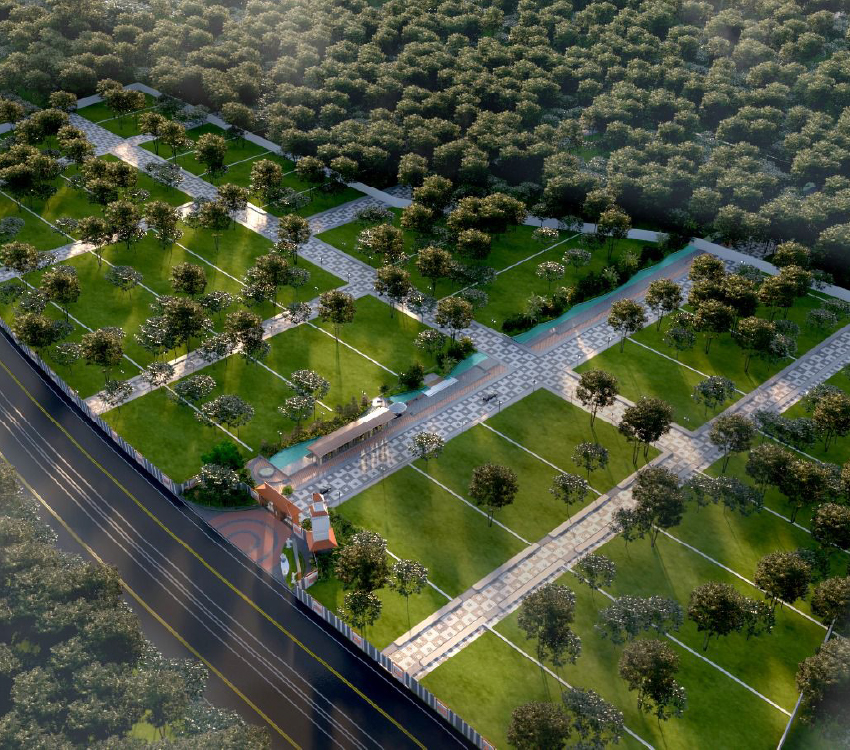 Aerial image of Saibya Sapling estate surrounded by dense greenery, plotted layout, and landscaped roads